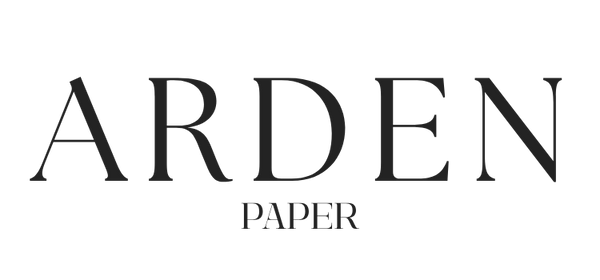 The logo for the business Arden Paper, ADEN is in big capital letters and the word paper is below in a smaller text size.