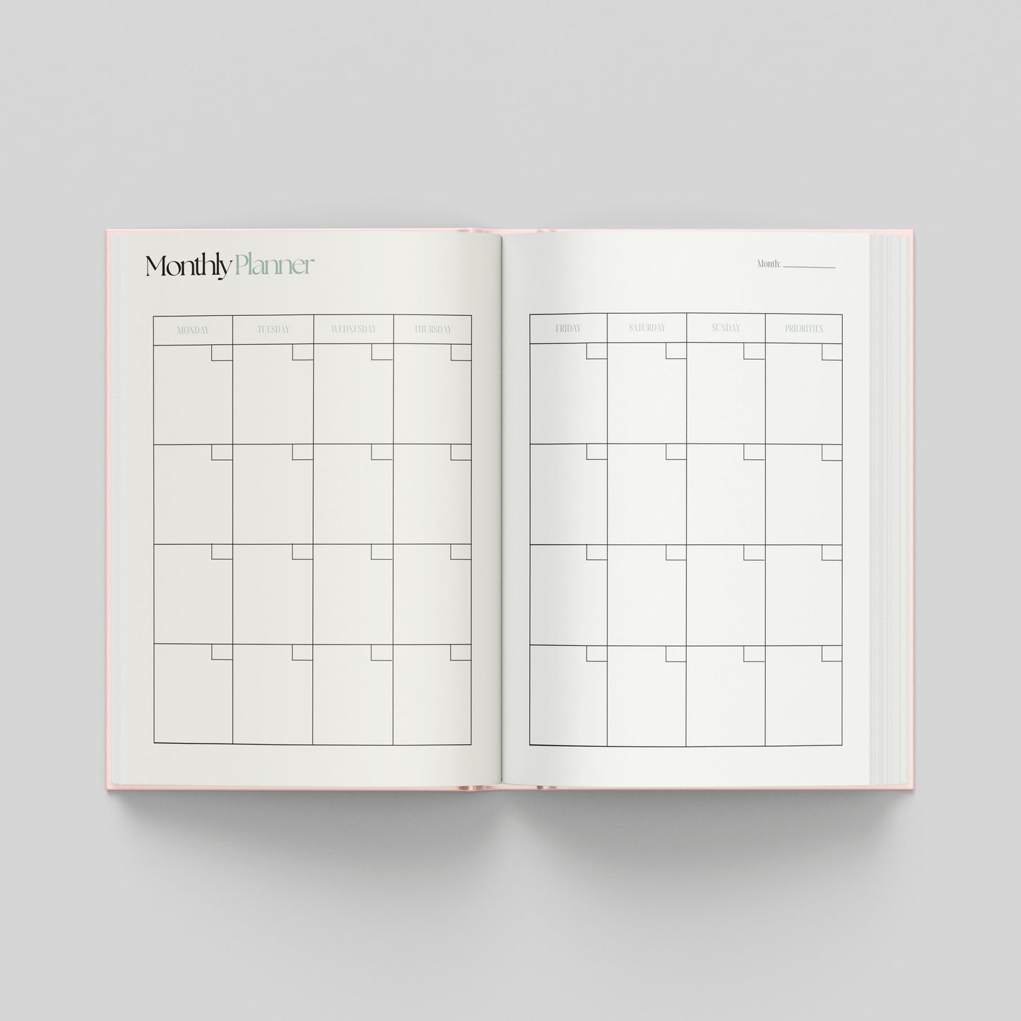 Monthly planning page inside the productivity planner with a calendar layout, weekday headings and spacious boxes for each day.