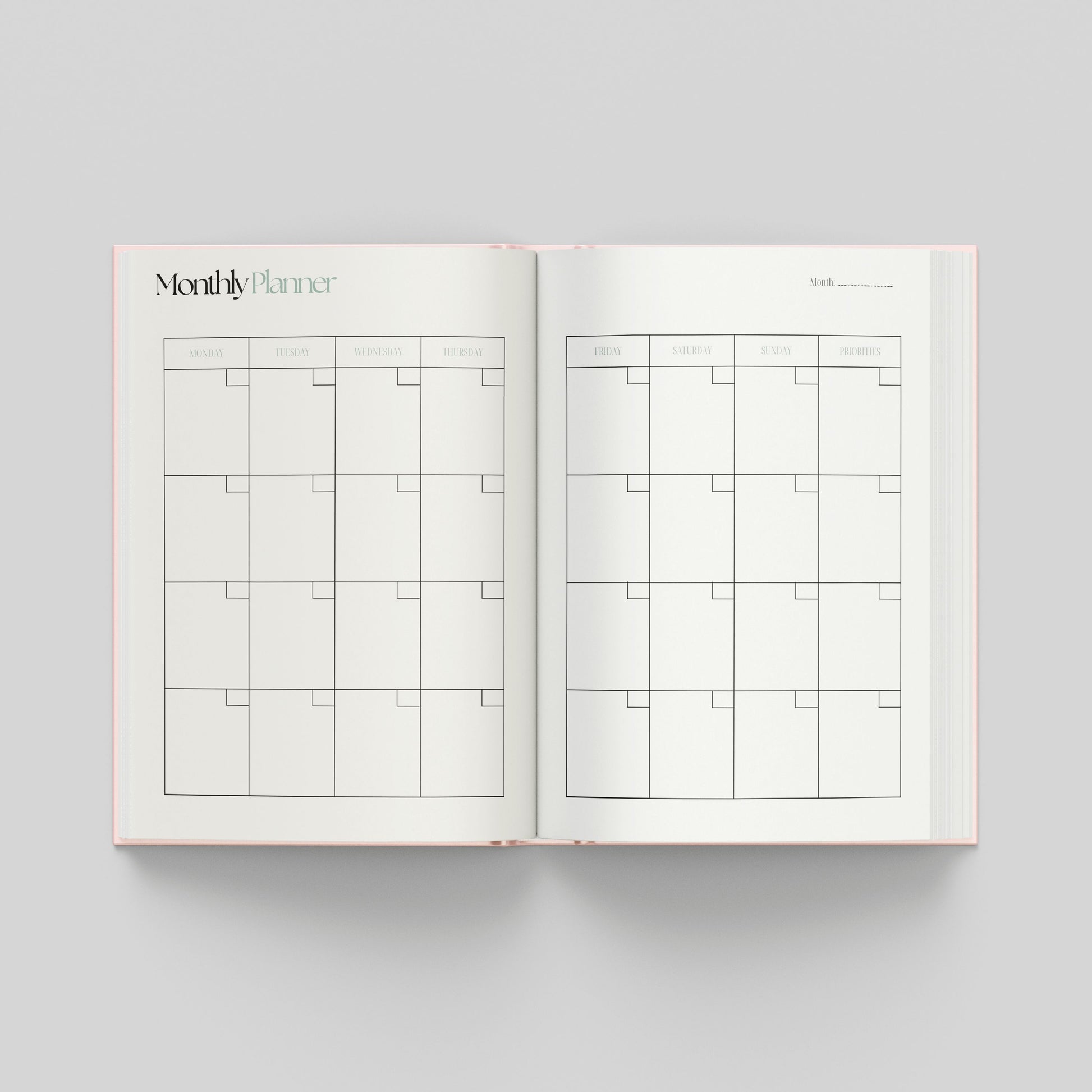 Monthly planning page inside the productivity planner with a calendar layout, weekday headings and spacious boxes for each day.