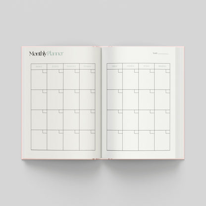 Monthly planning page inside the productivity planner with a calendar layout, weekday headings and spacious boxes for each day.