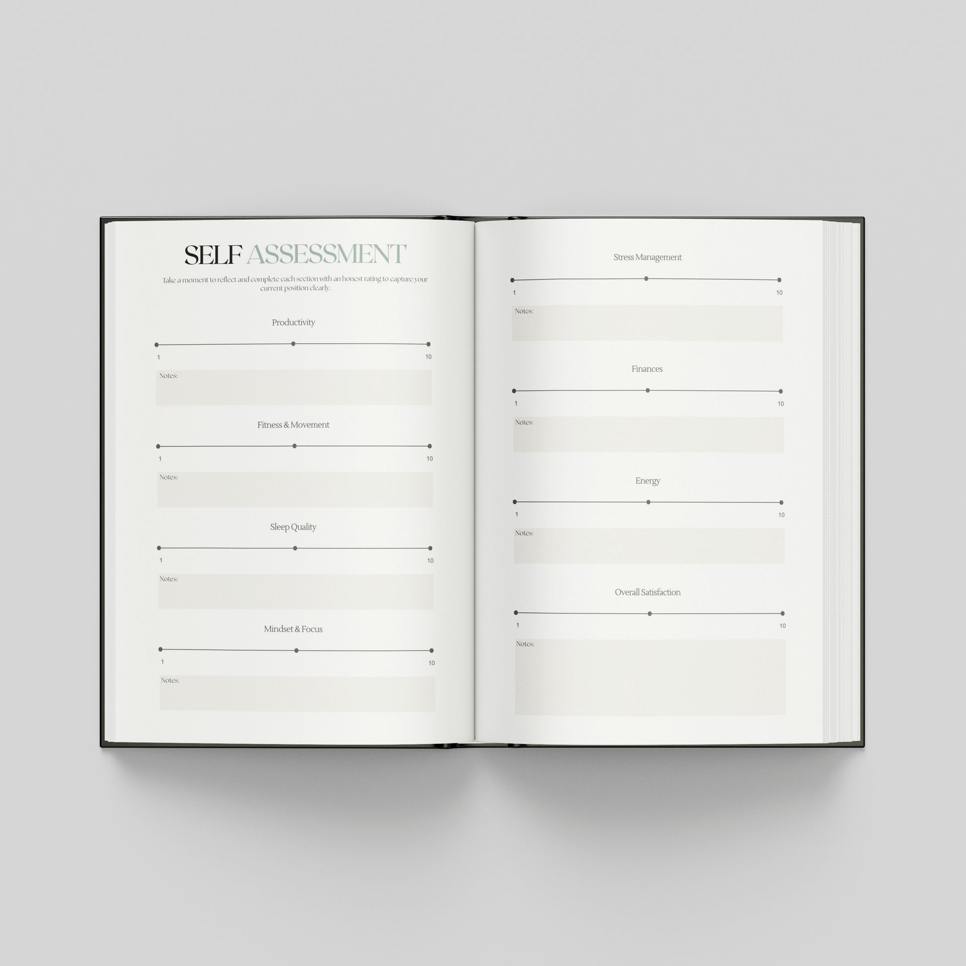 An open hardcover book showing two white pages with a self-assessment template layout, photographed from above on a light grey background.
